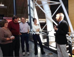 11 HFA Tour Group Listens to Guide