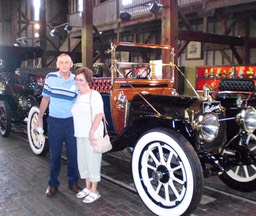 Eugene and Georgina Smith at one of the car barns in the Gilmore Car Museum