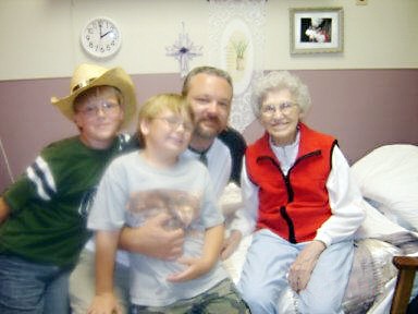 Stella Higdon, wife of Sam Higdon, with her grandson Ryan and great grandsons Joshua and Jacob