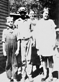 1924 Copperhill Left to right- Charles E. Higdon, brother Reese Higdon, mother Mary Arp Higdon, and cousin Kathryn Franklin (daughter of Lena Arp Franklin)