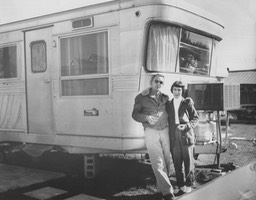 1957 - Mary Carmel & Tom in front of their mobile home, Augusta, GA