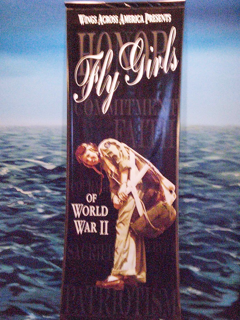 A banner spotlighting the Women's Air Ferry Service at the Kalamazoo AirZoo